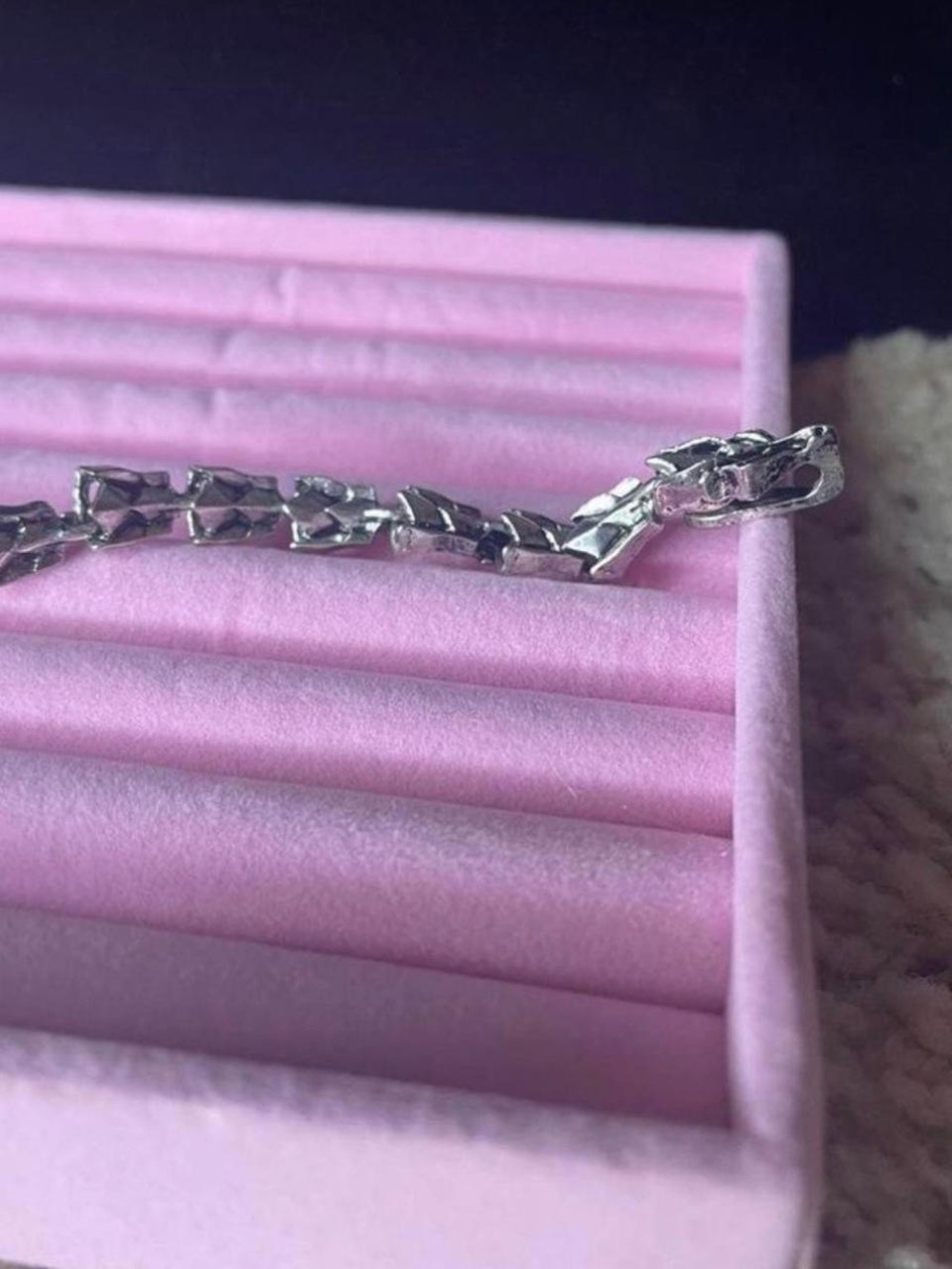 Silver dragon bracelet.